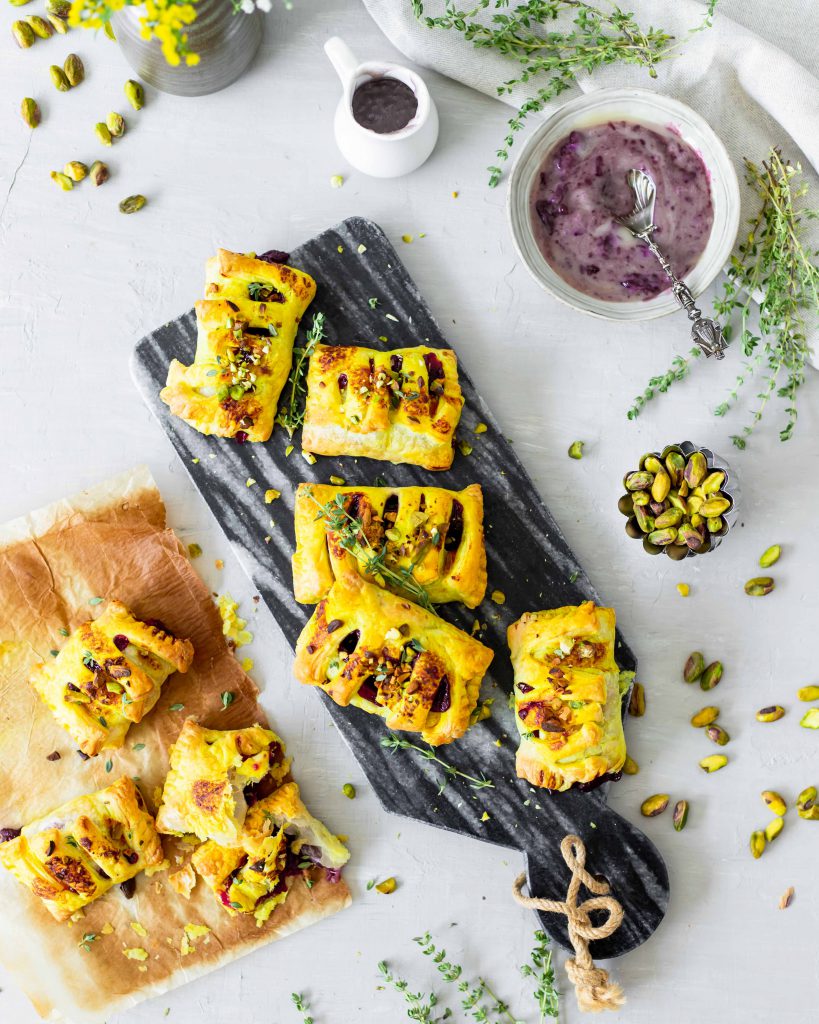 Flatlay of cherry pockets surrounded by toppings