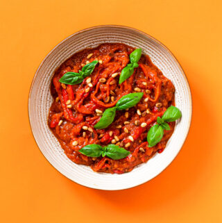 A bowl with roasted bell pepper sauce